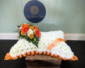 Orange funeral tribute shapes